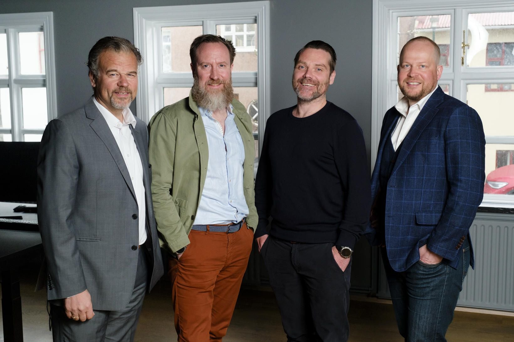 Baldur Stefansson, Gudjon Gudjonsson, Bjarni Thorvardarson, and partners at the announcement of new investment in OZ